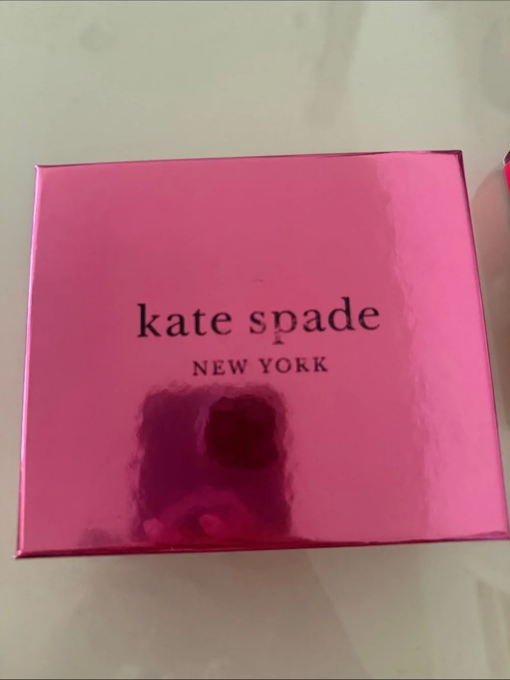 Kate Spade black Saffiano leather card holder with gold logo